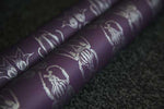 Beetle wallpaper, silver beetle illustration pattern on a royal purple background, showing the shimmering of the silver print
