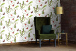 Carnivorous plants wallpaper shown in living room with a green armchair, lamp and side table. Wallpaper is colour illustration on a white background